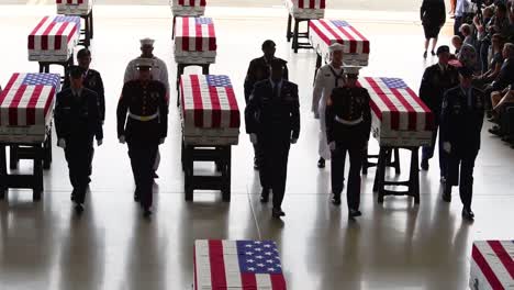 Flag-Draped-Coffins-Of-Dead-Us-Soldiers-Being-Returned-Home-Are-Displayed-In-A-Military-Hangar-3