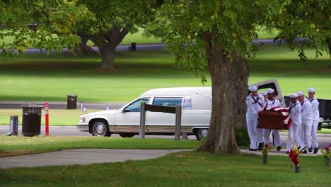Flag-Draped-Coffins-Of-A-War-Dead-Us-Soldier-Is-Transported-Through-A-Cemetery-For-Burial