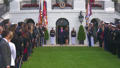 President-Trump-And-First-Lady-Melania-Trump-Emerge-From-The-White-House-And-Participate-In-A-Moment-Of-Silenc-Eon-Memorial-Day