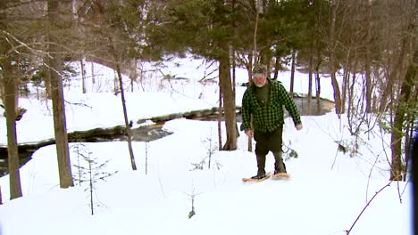 A-Refuge-Law-Enforcement-Officer-In-Vermont-Patrols-On-Snowshoes-And-Checks-A-Trapper