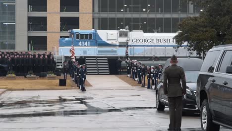 Servicemen-Of-The-Different-Branches-Of-The-Us-Armed-Forces-Stand-At-Attention-At-Texas'-College-Station-As-The-Train-Carrying-President-Bush'S-Casket-Pulls-In