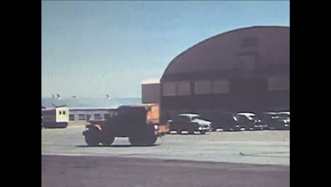 A-Jeep-Is-Driven-And-Workers-Arrive-And-The-Grounds-Of-The-Naca-High-Speed-Flight-Research-Station-Are-Shown-In-California