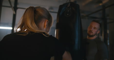 Woman-Boxing-Punching-Bag-in-Gym
