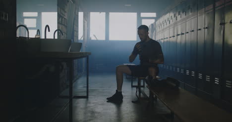 Boxer-Wrapping-Hands-in-Locker-Room