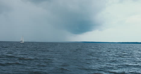 Sailboat-on-Stormy-Horizon-01
