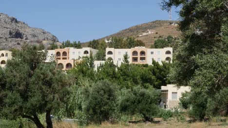 Greece-Crete-Tourist-Development-Above-Olive-Trees