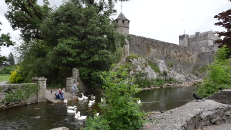 Ireland-Cahir-Castle-With-Grandparents-Feeding-Swans