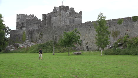 Ireland-Cahir-Castle-With-Man-Playing-Disk-Golf--