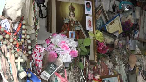 Ireland-County-Clare-Statues-And-Other-Offerings-At-St-Brigids-Holy-Well-Pan
