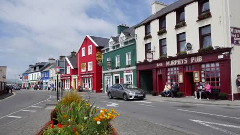Ireland-Dingle-Town-With-Flowers--Buildings-And-Cars