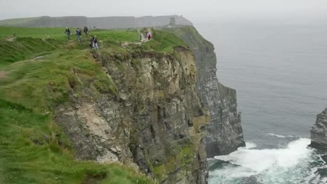 Ireland-County-Clare-People-Along-A-Path-At-Cliffs-Of-Moher-Zoom-Out