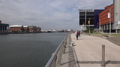 Northern-Ireland-Belfast-Walkers-Along-Queens-Quay-And-Odyssey-Pavilion