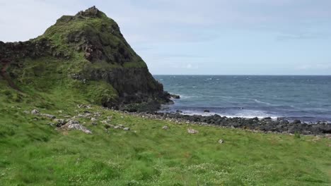 Northern-Ireland-Giants-Causeway-Pebble-Beach-With-Hill