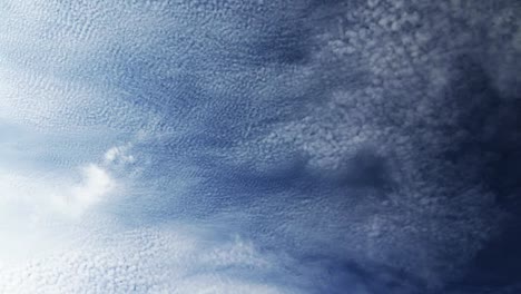 High-Altitude-Clouds-In-Small-Puffy-Forms-Of-Cirrocumulus-Time-Lapse