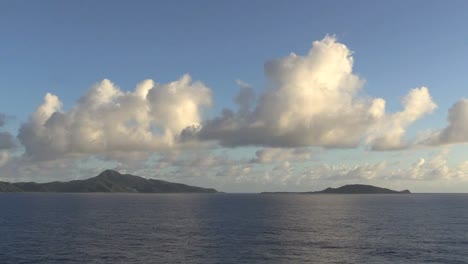 American-Samoa-In-The-Distance-Under-Clouds