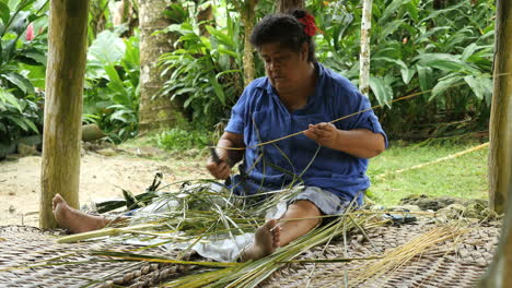 American-Samoa-Village-Woman-With-Palm-Fibers