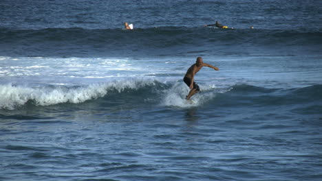 Oahu-A-Surfer-Rides-A-Wave.