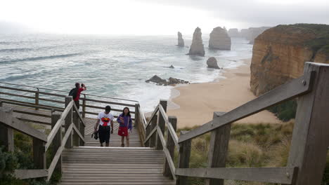 Australia-Great-Ocean-Road-12-Apostles-Tourists-On-Boardwalk-Climb-Steps
