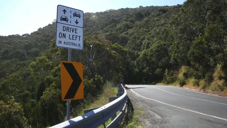 Australia-Great-Ocean-Road-Drive-On-Left-Sign-With-Truck