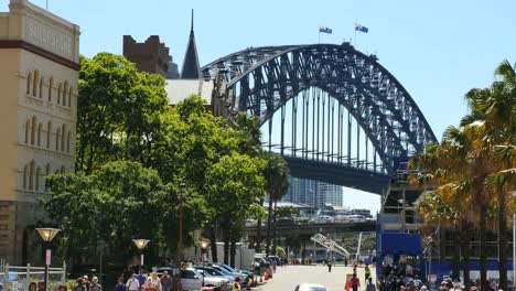 Australia-Sydney-Busy-Street-And-Harbour-Bridge