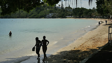 New-Caledonia-Girls-Walking-By-Lagoon