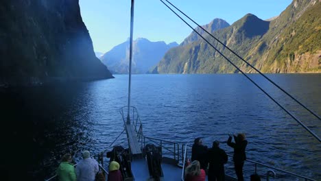 New-Zealand-Milford-Sound-With-People-On-Boat