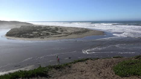 California-Salmon-Creek-Tidal-Bore-With-Couple