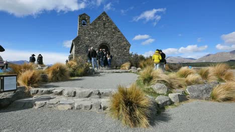 New-Zealand-Historic-Church-With-Tourists-At-Lake-Tekapo