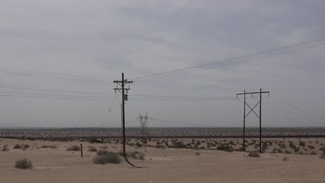 California-Sand-And-Power-Lines-With-Fence-Pan