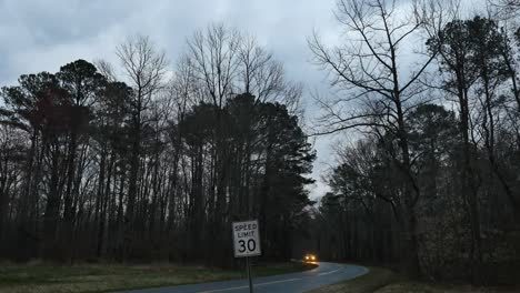 Virginia-Headlights-Of-Car-On-Road-In-Late-Evening