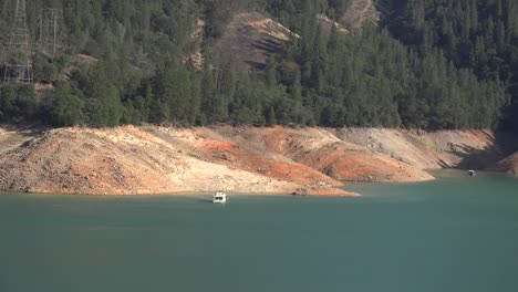 California-Shasta-Lake-With-Low-Water-Level-And-Boat