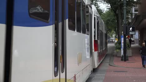Oregon-Portland-Broadway-And-Yamhill-Streetcar-Goes-By