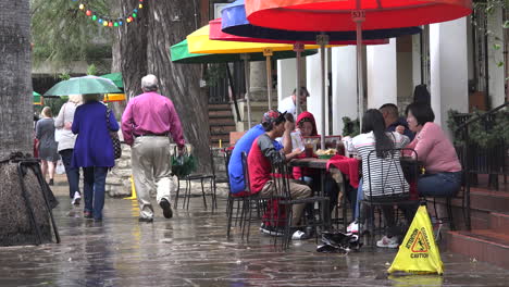 Texas-San-Antonio-People-Walking-Past-Umbrellas