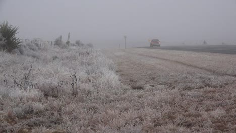 Texas-Icy-Roadside-With-Truck-Going-By