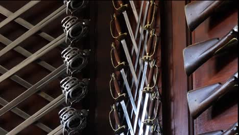 Virginia-Colonial-Williamsburg-Guns-And-Swords-On-Wall-Pan