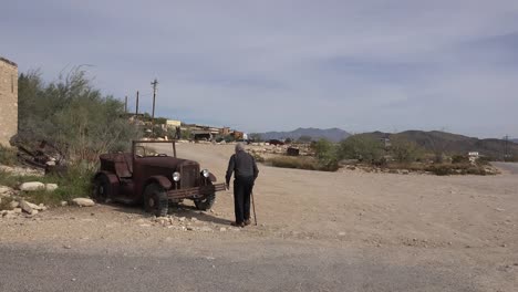 Texas-Terlingua-Old-Man-Approaches-Old-Car