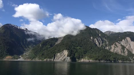 Chile-Aisen-Fjord-Clouds-On-Rugged-Mountains