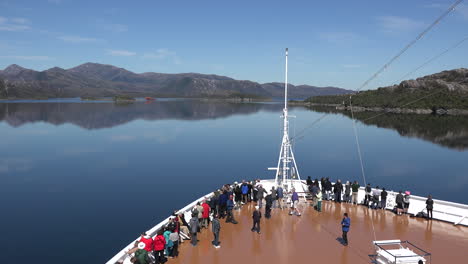 Chile-Passengers-Gather-Along-A-Railing-To-Look-At-Ship-Wreck