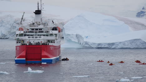 Antarctica-Expedition-Ship-And-Little-Kayaks