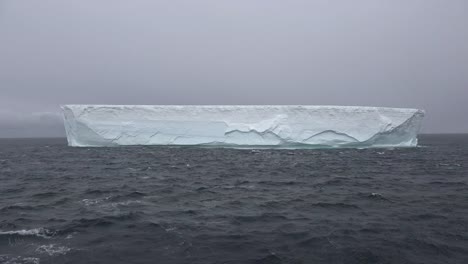 Antarctica-Iceberg-From-An-Ice-Shelf-Floats-By