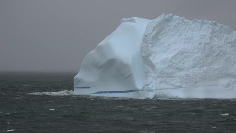 Antarctica-Iceberg-With-Blue-Streak-Zooms-Out