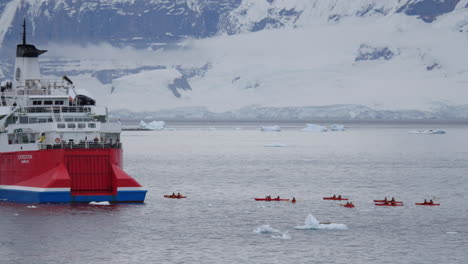 Antarctica-Kayaks-Behind-Expedition-Ship