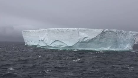 Antarctica-Pans-And-Zooms-Out-On-Iceberg