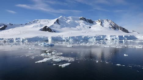 Antarctica-Passing-Ice-Flows-And-Mountain