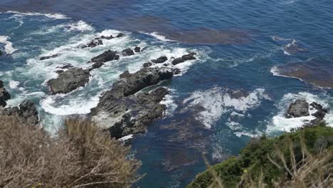 California-Big-Sur-Water-Churning-In-Rocks-With-Kelp