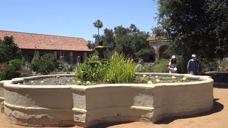 California-San-Juan-Capistrano-Mission-Courtyard-Fountain-Tourists
