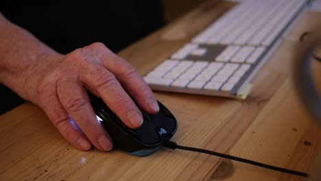 Old-Hand-And-Computer-Mouse