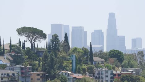 California-Los-Angeles-Tall-Houses-On-Hill-With-Distant-Buildings