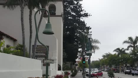 California-Ventura-Mission-San-Buenaventura-With-Camino-Real-Sign-And-Street-Zoom-In
