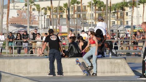 Los-Angeles-Venice-Beach-Skaters-Taking-A-Break-With-Spectators